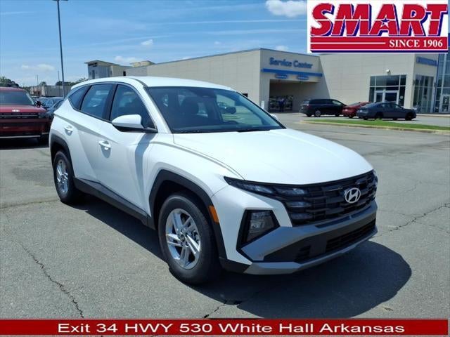 2026 Hyundai TUCSON SE FWD in Serenity White Pearl — front three-quarter view